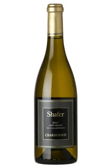 A bottle of Shafer 2023 Red Shoulder Ranch Chardonnay, Napa Valley with a label showing the brand, vintage, and variety.