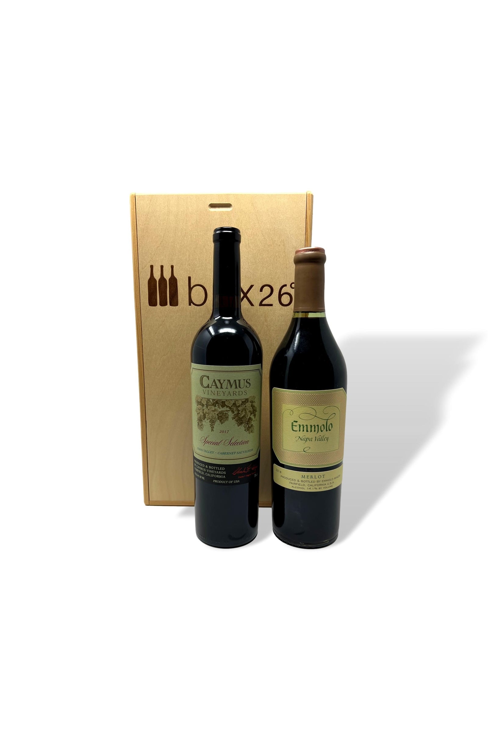 Two bottles of Caymus wine in front of a Caymus 2 bottle gift pack box.