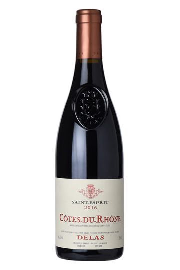 A bottle of Delas Freres 2021 'Saint Esprit' Cotes du Rhone Rouge