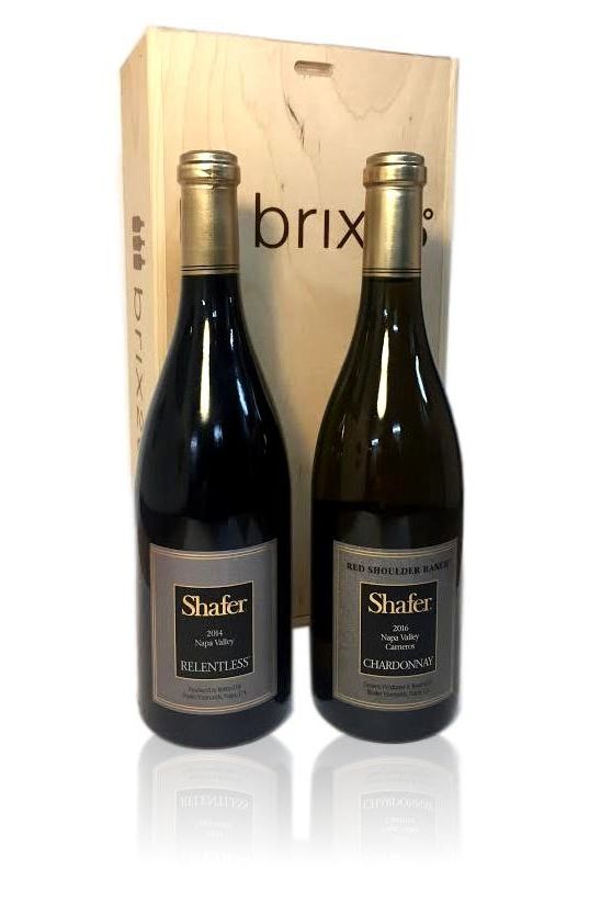 Two bottles of Shafer wine placed in front of a wooden box with the Brix26 logo.